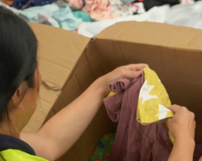 lady sorting clothes