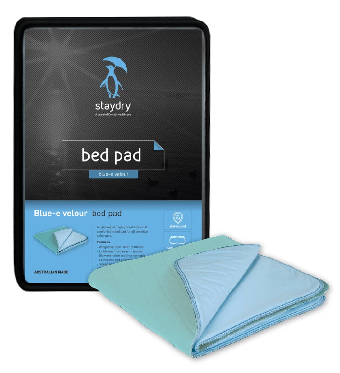 Aqua colour bed pad sitting next to its packaging