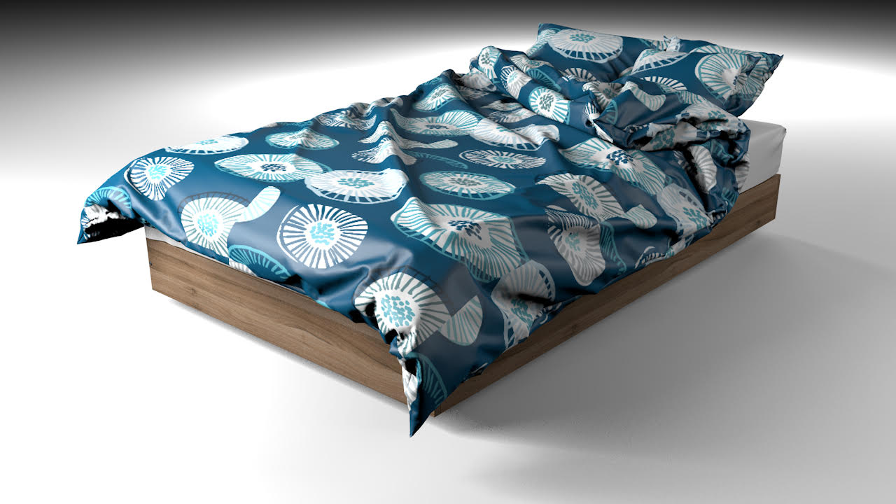 Blue printed quilt cover on a bed
