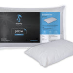 Whitte pillow sitting next to its packaging.